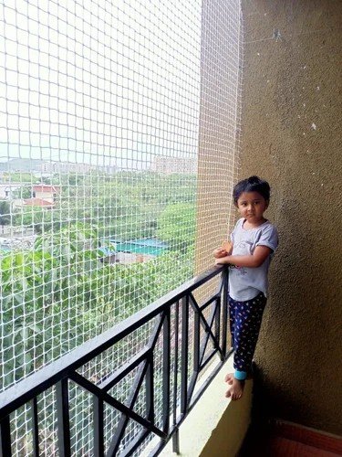 Child and pet safety net on apartment balcony in Guntur